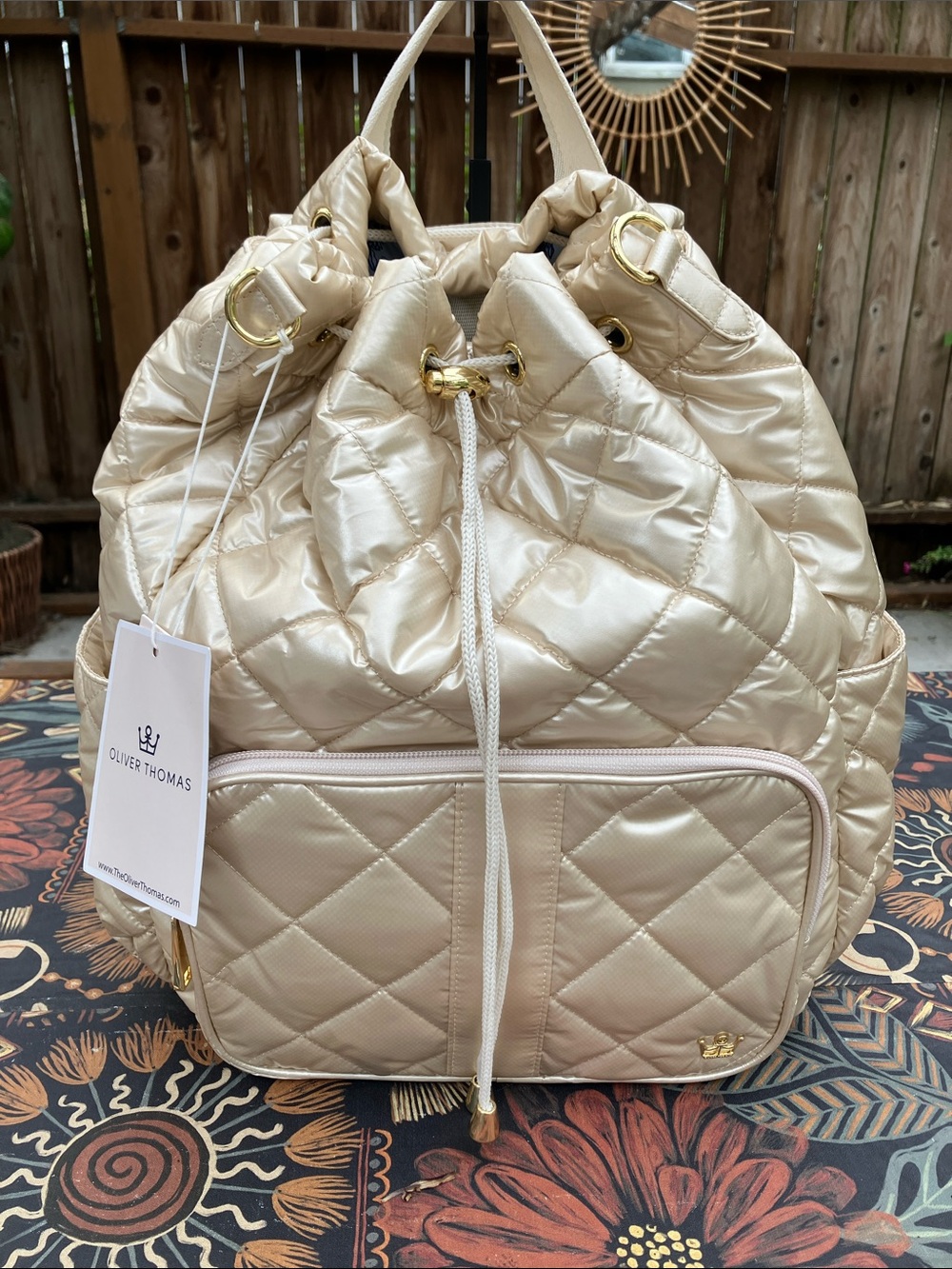 NWT Oliver Thomas “Maxed out” champagne quilted backpack with RFID
